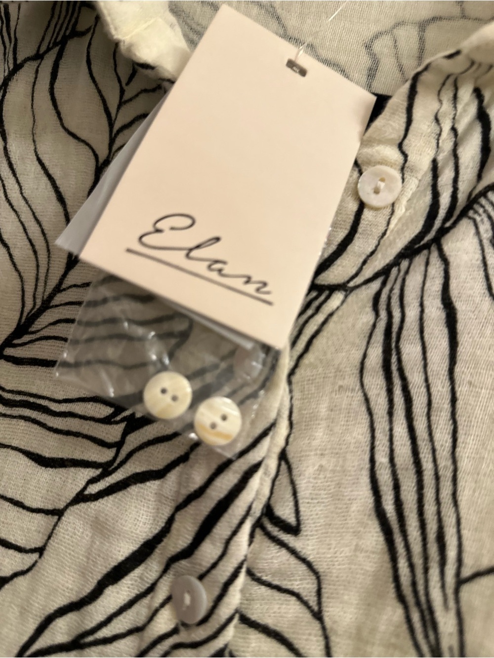 Elan Romper NWT Cream AND Black Leaf Design